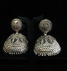 Silver oxidized earrings in Jumki pattern and exclusive work for a stunning and stylish look.