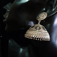 Silver oxidized earrings in Jumki pattern and exclusive work for a stunning and stylish look.