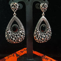 Silver oxidized earrings with never seen pattern and exclusive silver work with black stone for a stunning and stylish look.