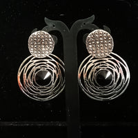 Silver oxidized earrings with never seen pattern and exclusive silver work with black stone for a stunning and stylish look.