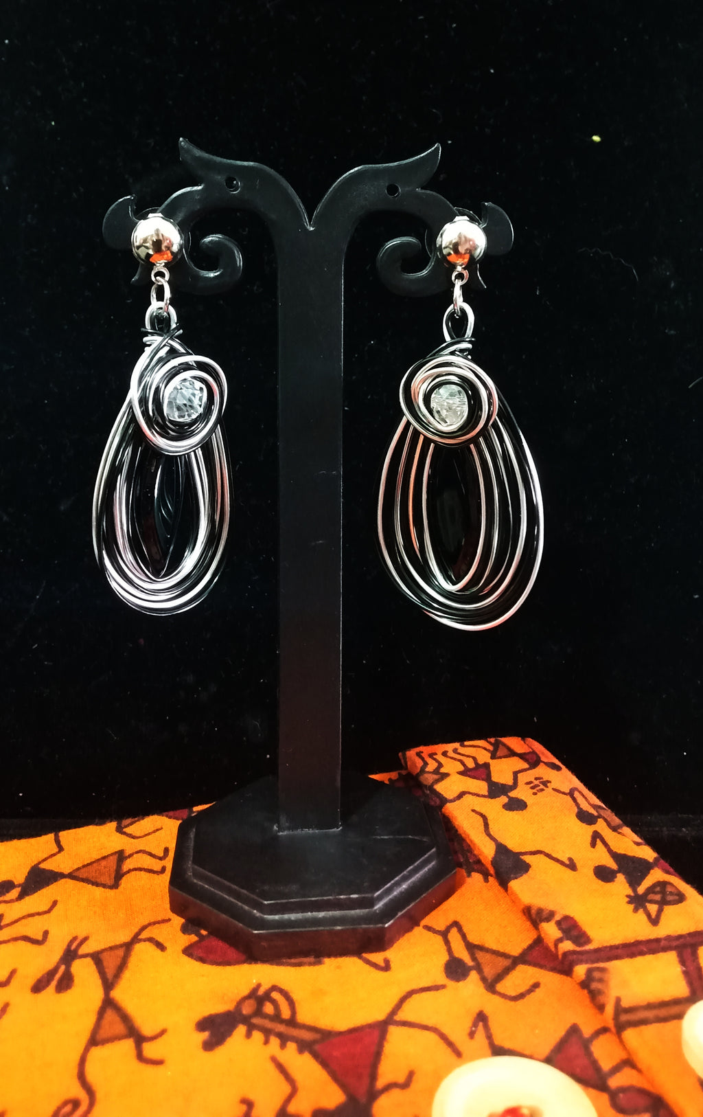 Silver oxidized earrings with never seen pattern and exclusive silver work with black stone for a stunning and stylish look.