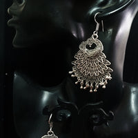 Silver oxidized earrings with exclusive silver peacock  work for a stunning and stylish look.