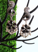 E0397_Gorgeous  peacock design danglers studded with a touch of black stones & bead drops (long hangings).