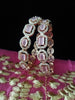 B0178_S_Elegant Rose Gold bangles embellished with American Diamond stones with a touch of dazzling pink stones.