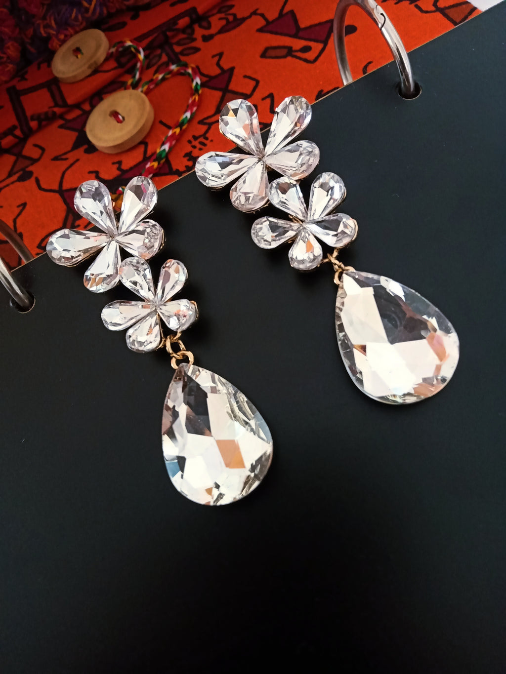 E0461_Gorgeous flowery pattern earrings with a tear drop hanging studded with bright stones (medium size hanging)