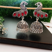 E0499_ Classy German silver oxidized crafted jumkas with peacock design and with a touch of bright red stones (medium size hanging)