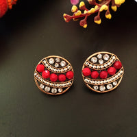E0507_ Trendy circular shaped studs with embossed crystals with a touch of stones.