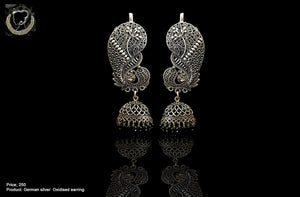 E029_Classy oxidized silver crafted earring with 'Kanpasha' style.