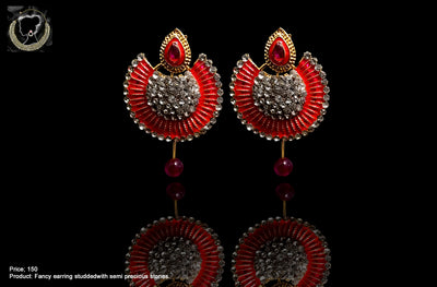 E038_Classy golden & red colored crafted earring with delicate work of white stone