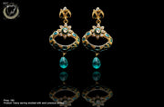 E041_Classy golden colored crafted earring with delicate work of green Minakari