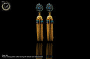 E065_Classy golden crafted earring with delicate work of beautiful blue stones.