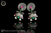 E081_Classy german silver oxidized crafted jumki design earring with delicate work of multicolored stones.