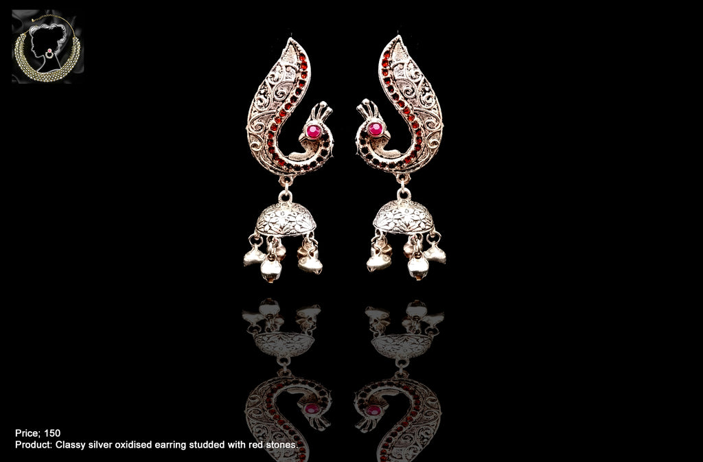 E082_Classy german silver oxidized crafted jumki& peacock design earring with delicate work of pink & red stones.