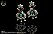 E084_Classy German silver oxidized crafted design earring with delicate work of green stones.