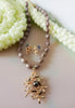 N0296_Lovely trendy floral design necklace set with glossy bead work studded with a touch of stones.