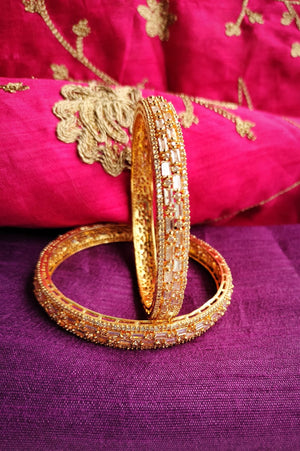 B0275_Classy Style Gold Plated Bangles studded  with American Diamond stones.