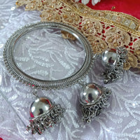 B0151_ Glossy fine polish Sparkling silver color metal bangles along with jumka drops with a touch of beads.