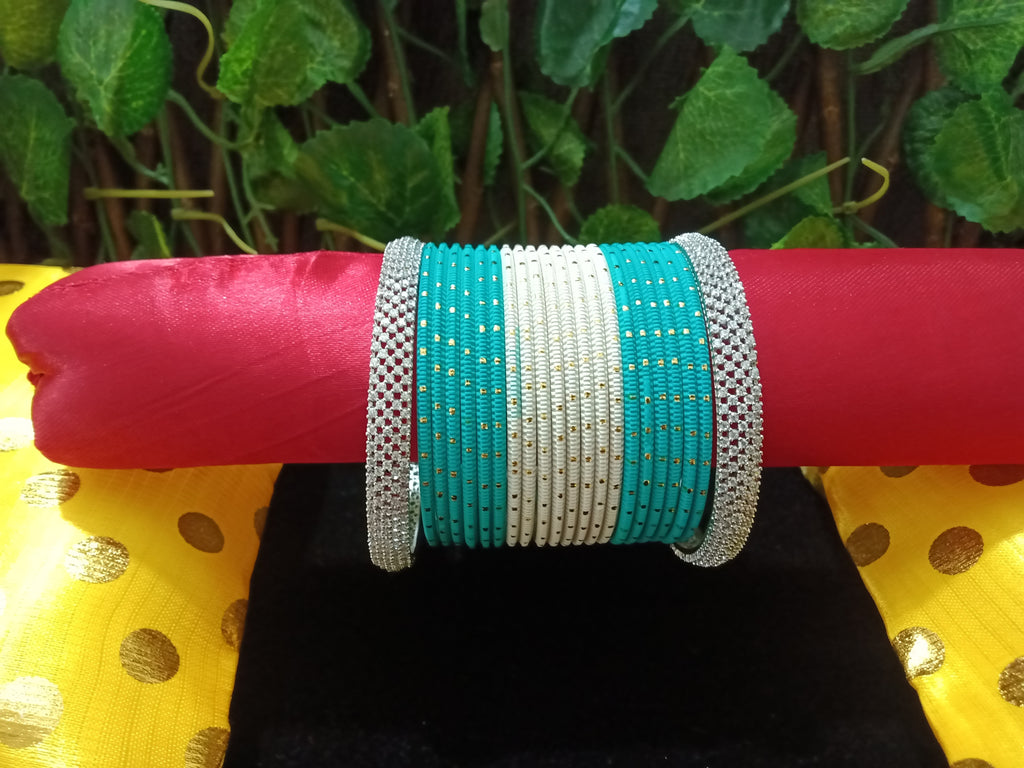 B0150_Exquisite bangles set with colorful metal bangles along with American Diamond bangles.