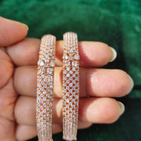 B0175_Elegant delicate crafted Rose gold bangles embellished with American Diamond stones.