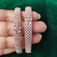 B0175_Elegant delicate crafted Rose gold bangles embellished with American Diamond stones.