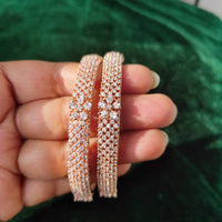 B0175_Elegant delicate crafted Rose gold bangles embellished with American Diamond stones.