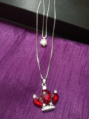 N0281_Classy necklace with crown shaped pendant with sparkling red and white stones.