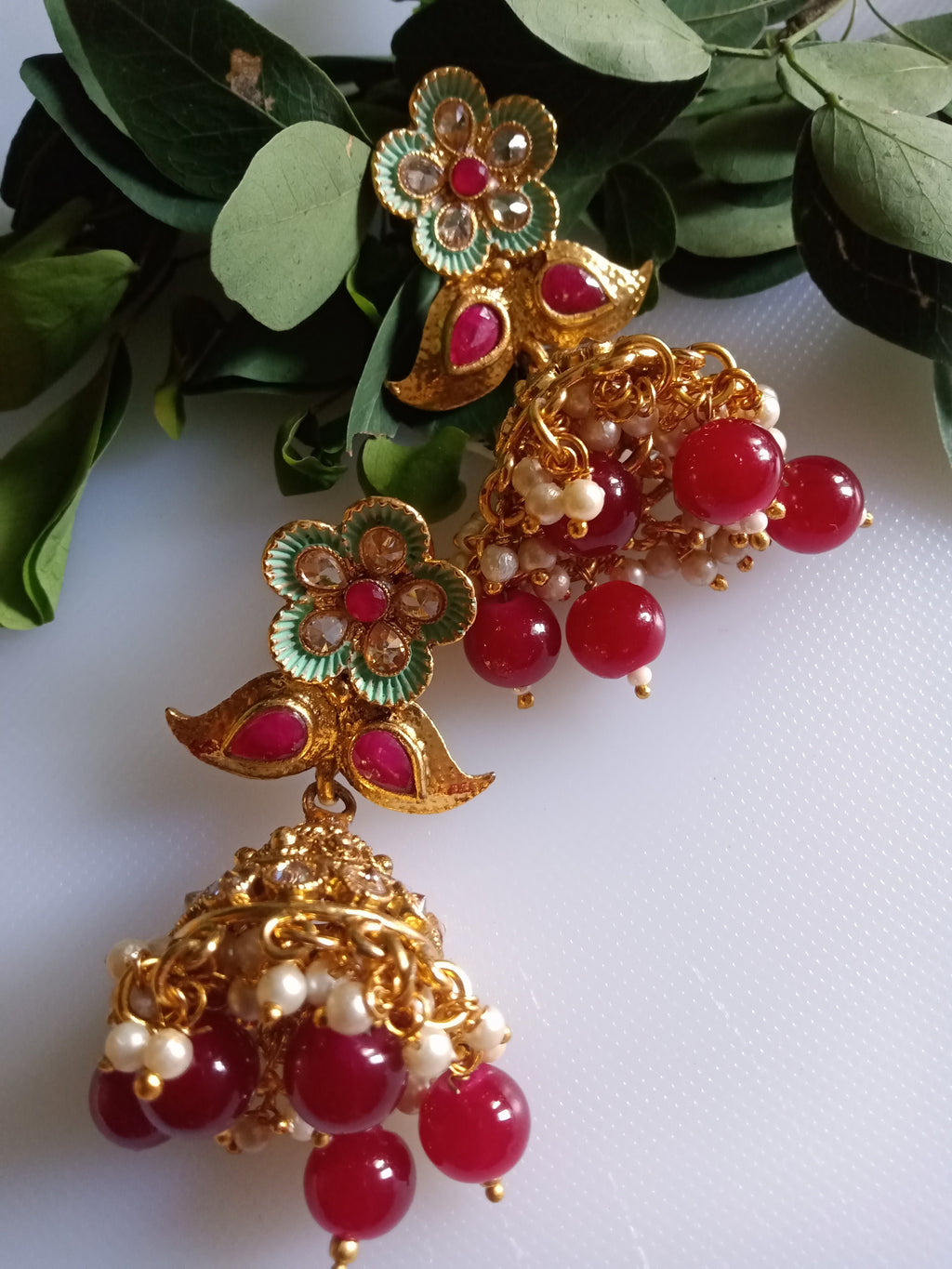 E0796_Gorgeous crafted flower & leafy design  Meenakari jumkas with a touch of dazzling stones along with bead drops.