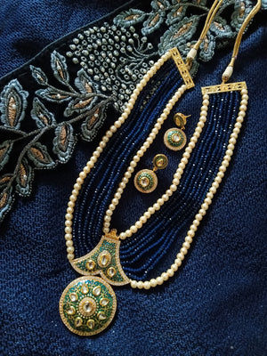 N0133_Gorgeous elaborated blue color Crystal  layered necklace set studded with kundan stones with a touch of pearls.