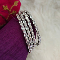 B0269_Gorgeous sleek design American diamond bangles with beautiful stone work