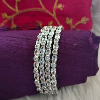 B0269_Gorgeous sleek design American diamond bangles with beautiful stone work