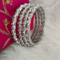 B0269_Gorgeous sleek design American diamond bangles with beautiful stone work