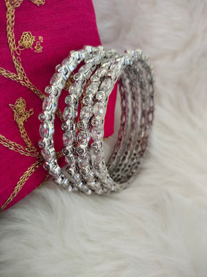 B0269_Gorgeous sleek design American diamond bangles with beautiful stone work