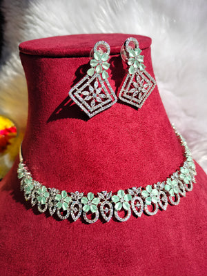 N0440_Elegant American Diamond stones embellished necklace set with delicate stone work studded with a touch of green stones.