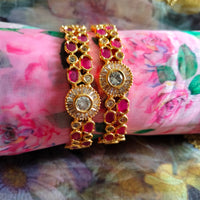 B0289_Beautiful golden bangles with delicate craftwork with a touch of ruby stones.