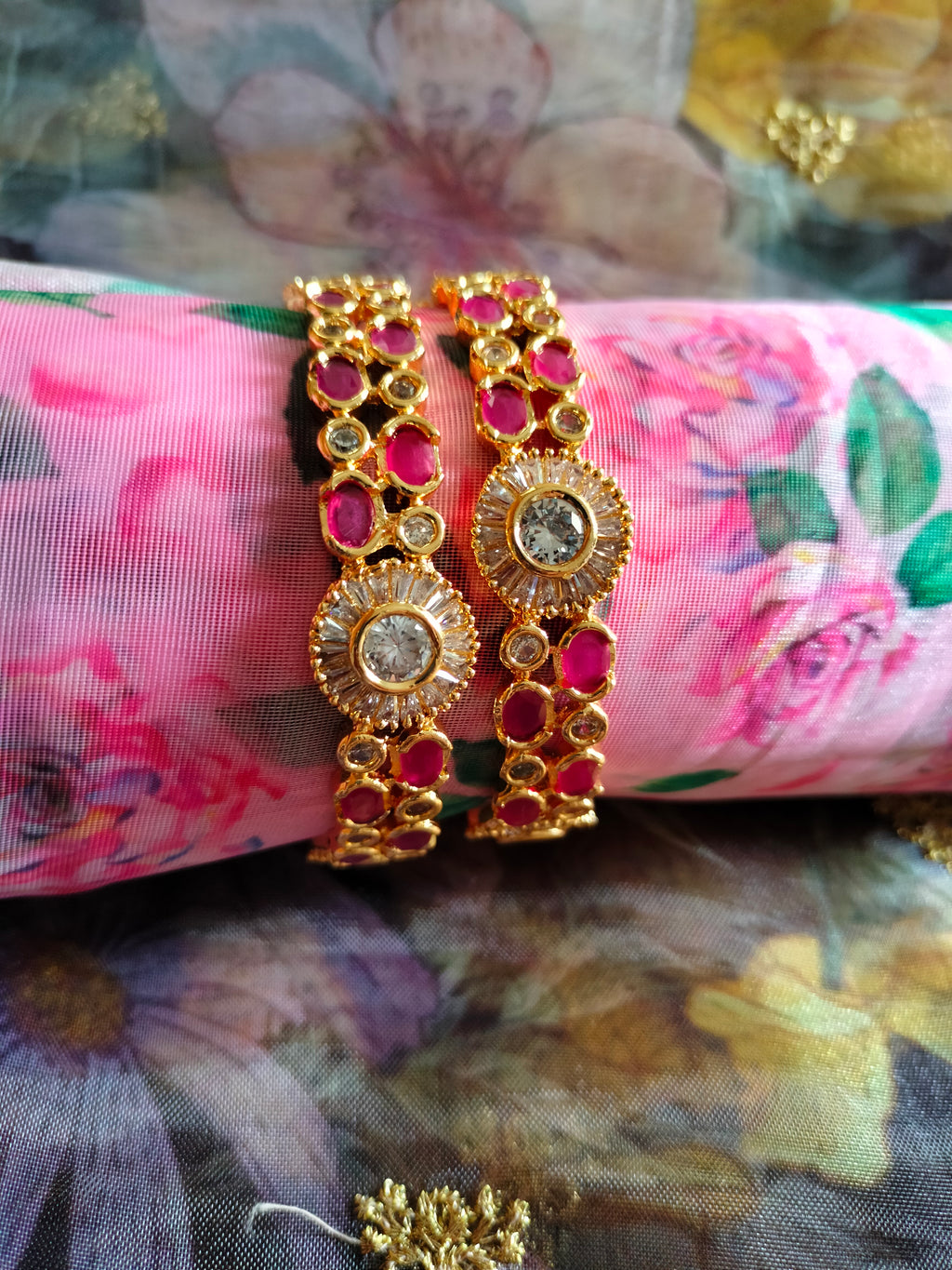 B0289_Beautiful golden bangles with delicate craftwork with a touch of ruby stones.