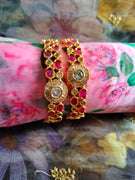 B0289_Beautiful golden bangles with delicate craftwork with a touch of ruby stones.