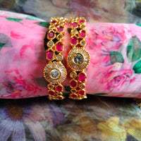 B0289_Beautiful golden bangles with delicate craftwork with a touch of ruby stones.