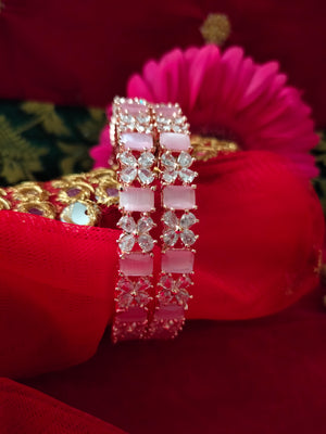 B0294_Lovely floral design rose gold Bangles studded with American Diamond stones with delicate stone work.