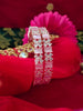 B0294_Lovely floral design rose gold Bangles studded with American Diamond stones with delicate stone work.