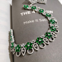 N0553_Elegant dazzling American Diamond stones embellished necklace set with delicate stone work with a touch of green stones.