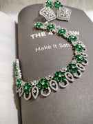 N0553_Elegant dazzling American Diamond stones embellished necklace set with delicate stone work with a touch of green stones.