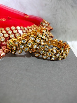 B0284_Classy Ethnic diamond design bangles with delicate work of kundan stones.