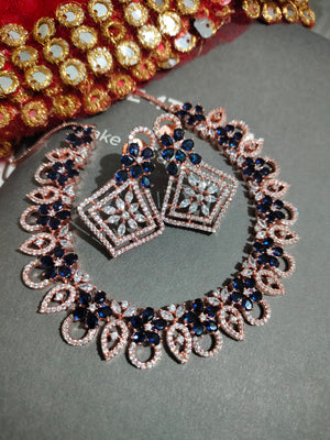 N0409_Gorgeous necklace embellished with american diamond stones with a touch of blue stones with delicate work.