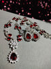 N0562_Lovely designer American Diamond stones necklace set with a touch of wine red stone.