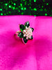 R065_Gorgeous flower design American Diamond studded statement ring studded with a touch of green stones.