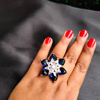 R069_Elegant flower design American Diamond studded statement ring with a touch of navy blue  stones.