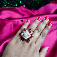 R066_Gorgeous flower design American Diamond studded statement ring studded with red stones.