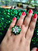 R059_Elegant flower design American Diamond studded statement ring with a touch of green stones.