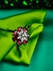 R062_Lovely flower design American Diamond studded statement ring studded with wine red colour stones.