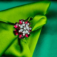 R062_Lovely flower design American Diamond studded statement ring studded with wine red colour stones.